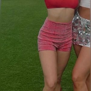 Red studded shorts
